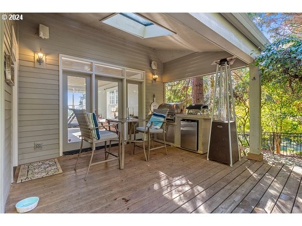 264 Southeast 41st Court Gresham, OR 97080 - Photo 36 of 37 a view of a dining room with furniture window and wooden floor