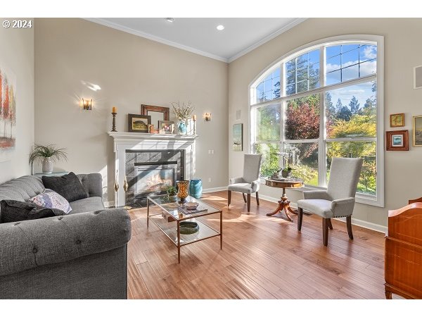 264 Southeast 41st Court Gresham, OR 97080 - Photo 6 of 37 a living room with fireplace furniture and a large window