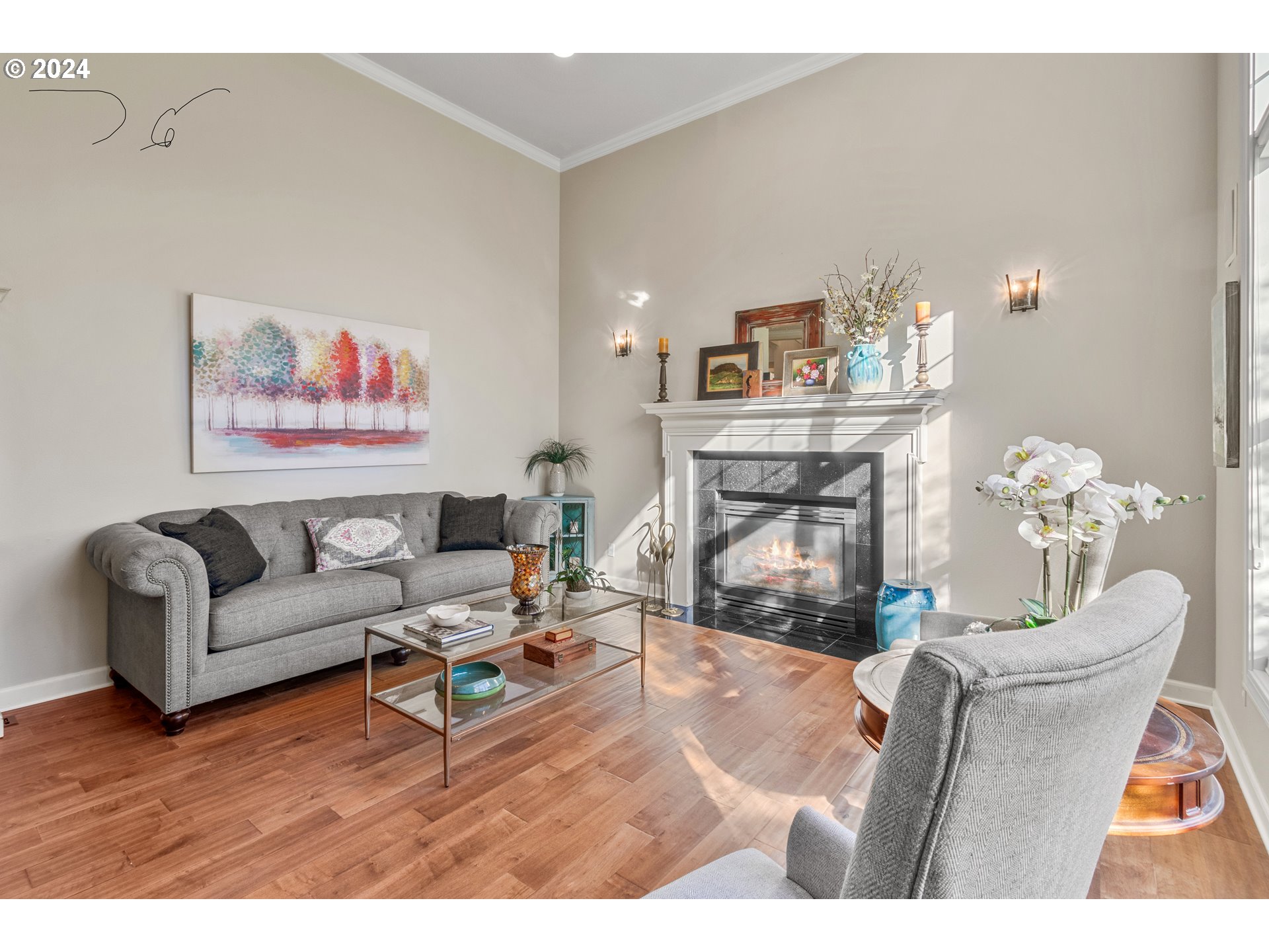 264 Southeast 41st Court Gresham, OR 97080 - Photo 7 of 37 a living room with furniture a fireplace and a painting