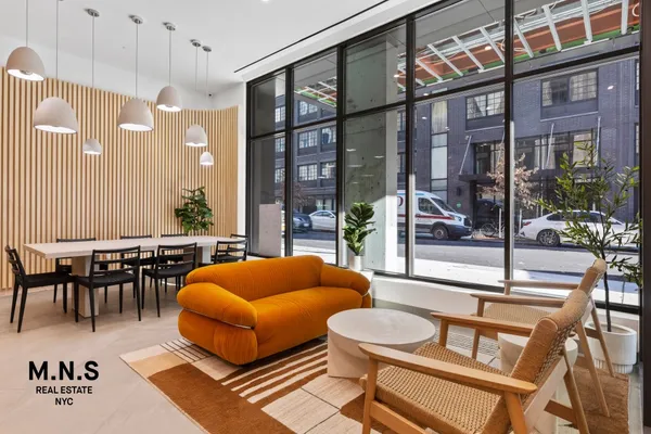 a outdoor space with lots of tables and chairs