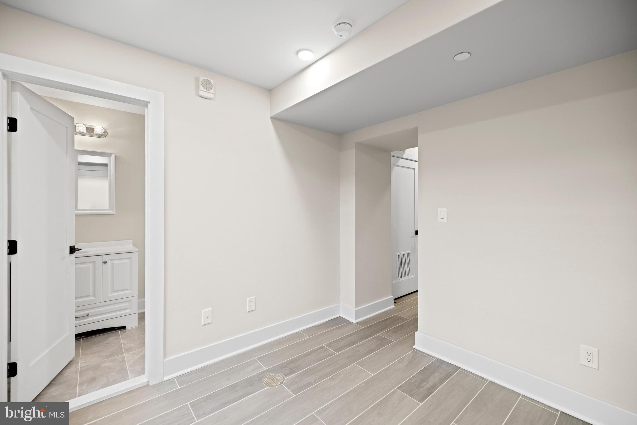 824 18th Street Northeast, Unit 1 Washington, DC 20002 - Photo 11 of 21 wooden floor in an empty room