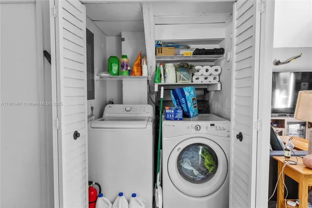 a utility room with dryer and washer