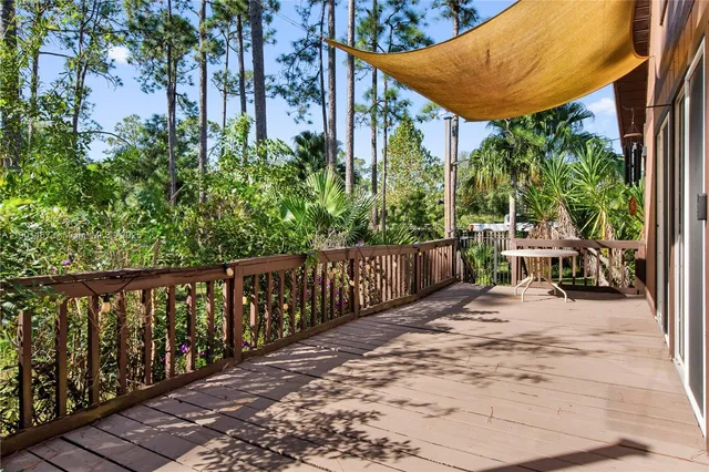 a view of two chairs on the roof deck