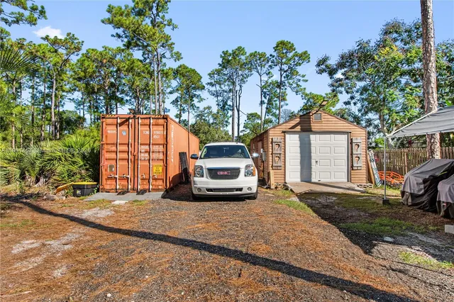 a car parked in front of a house