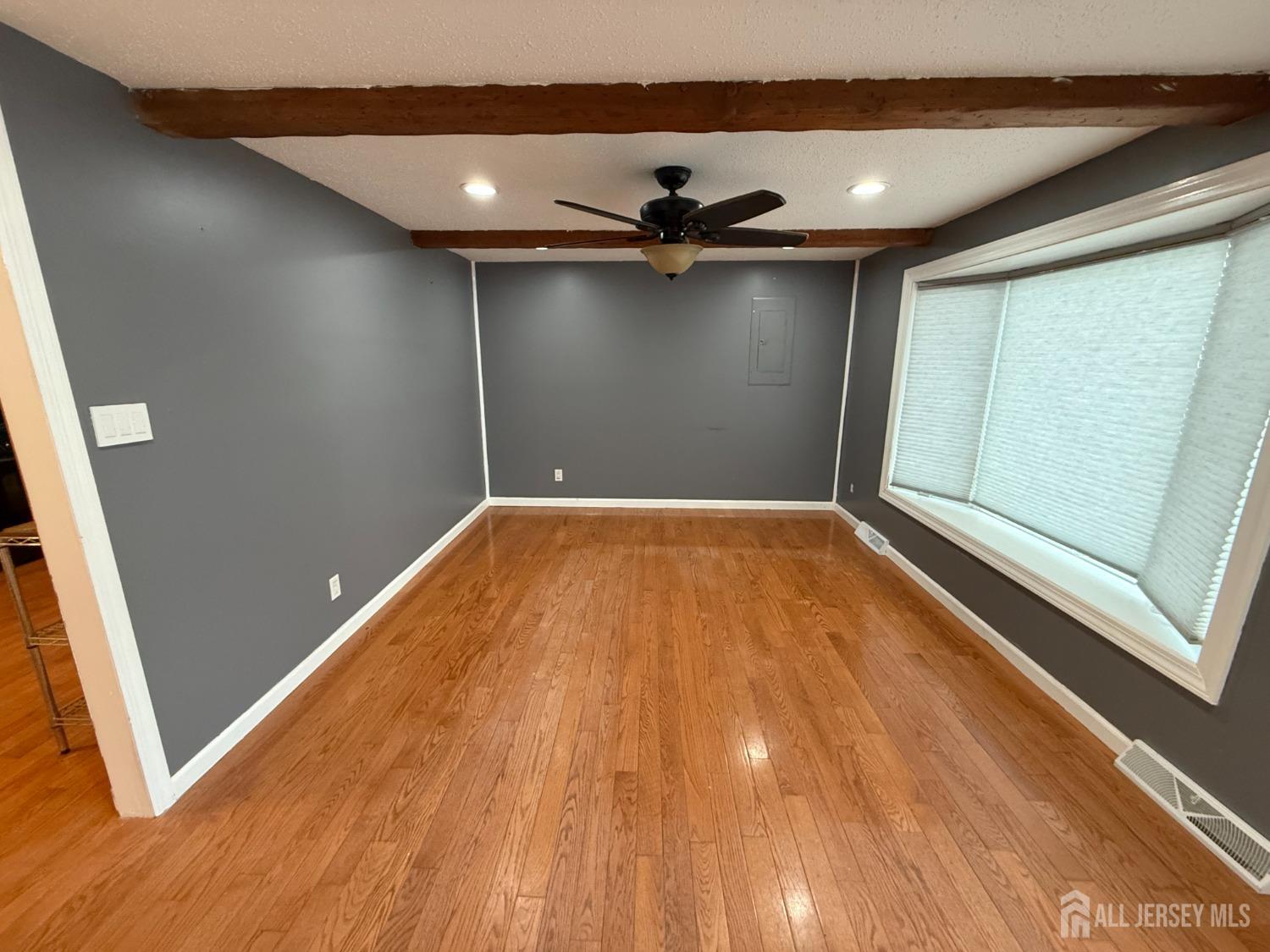 109 John Street Helmetta, NJ 08828 - Photo 2 of 18 a view of empty room with wooden floor