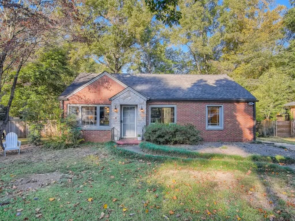 1179 North Carter Road Decatur, GA 30030 - Photo 1 of 1 a front view of a house with a garden and yard