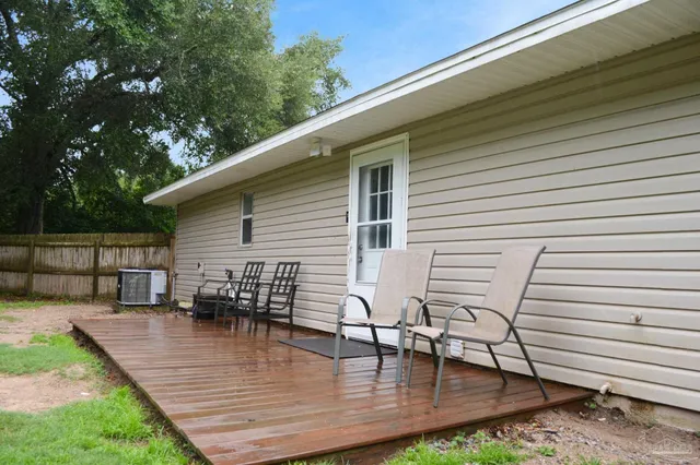 a view of a backyard with a cabin