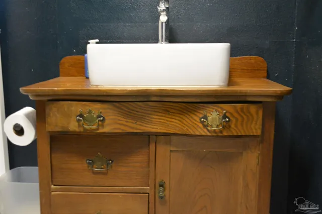 a bedroom with a bed and a flat screen television