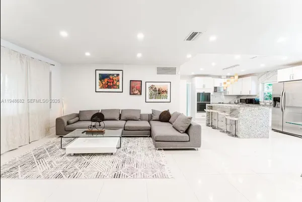 a living room with furniture and a couch