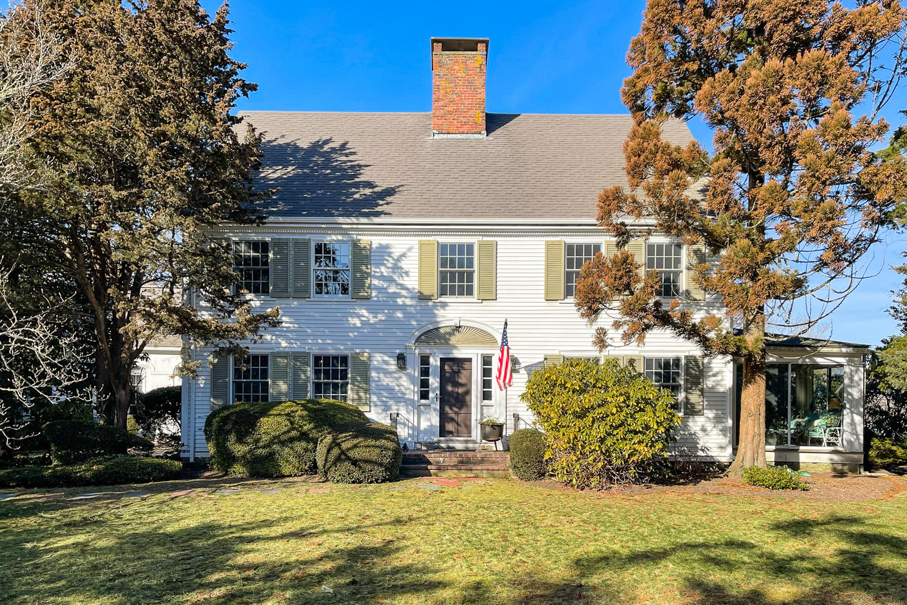 163 Pochet Road Orleans, MA 02653 - Photo 1 of 67 a view of a house with a cars park side of a road