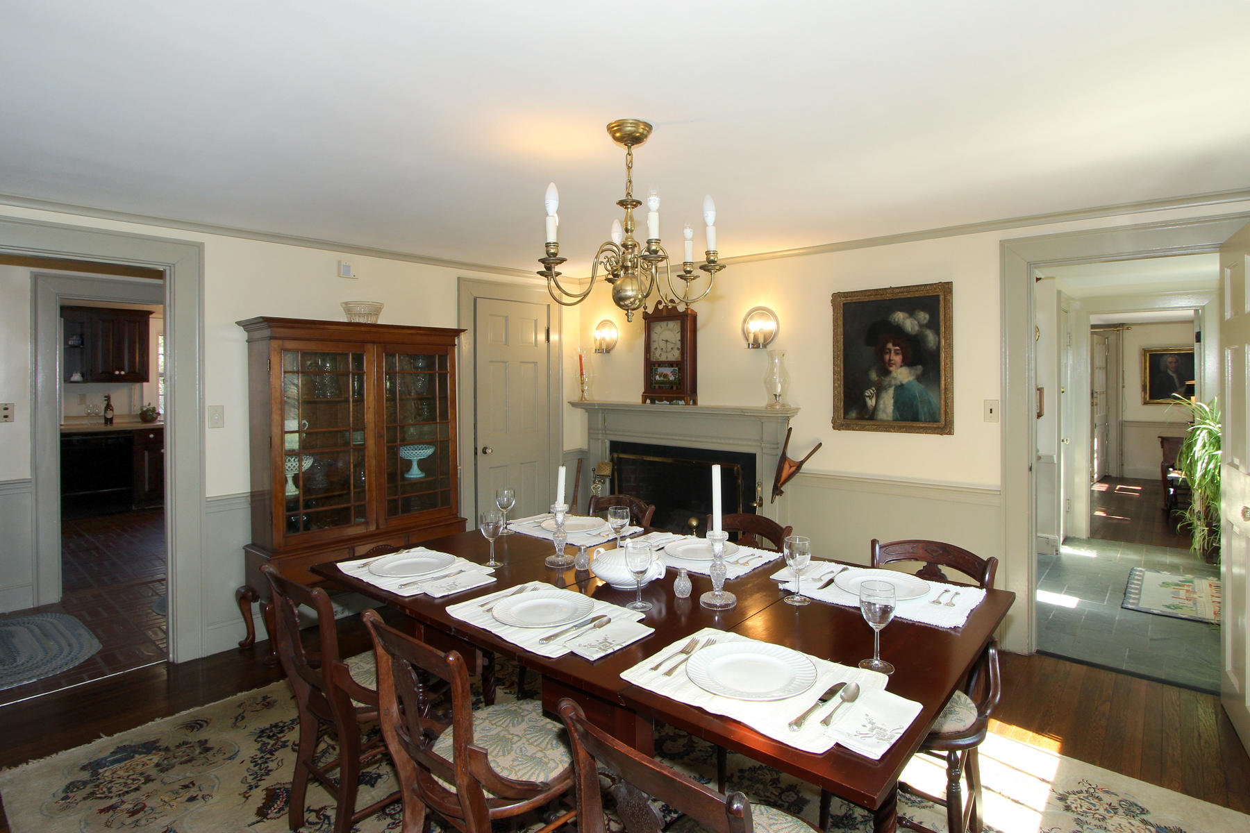 163 Pochet Road Orleans, MA 02653 - Photo 15 of 67 a view of a dining room with furniture and a chandelier