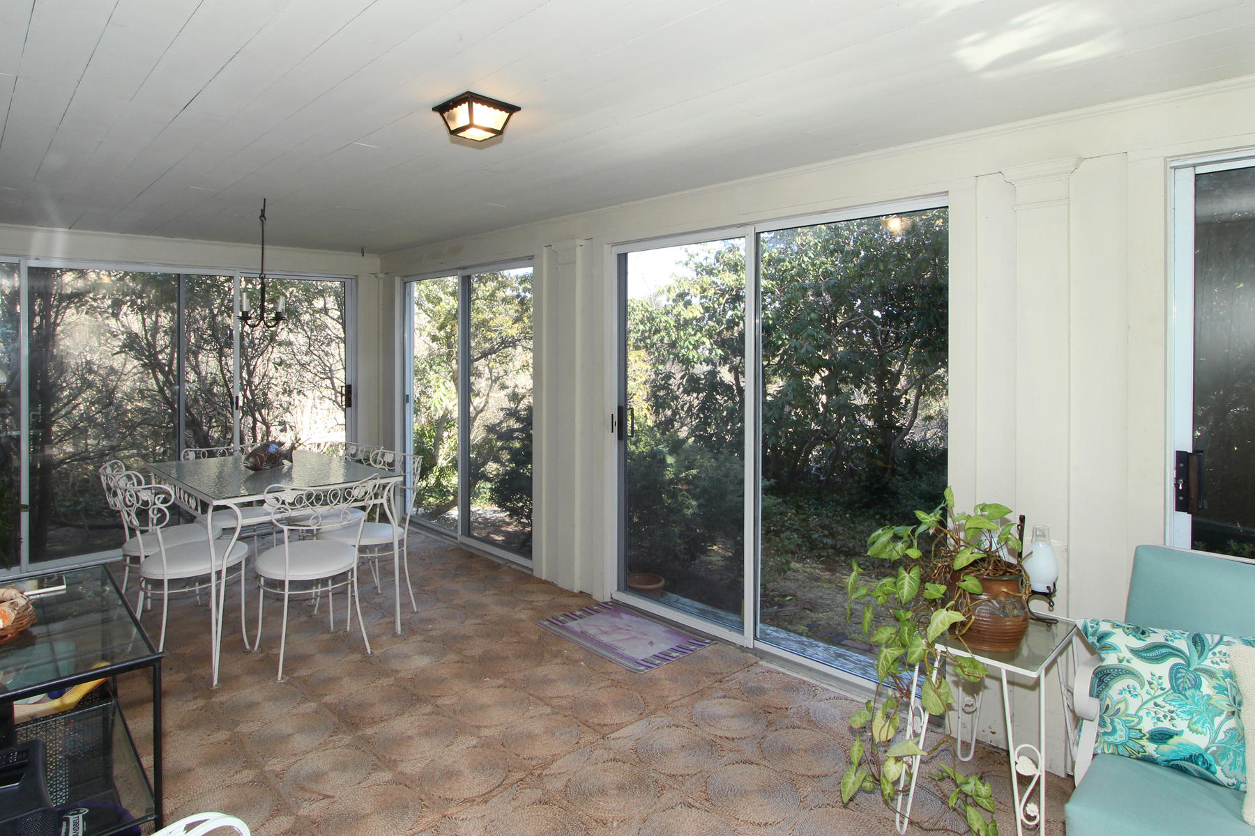 163 Pochet Road Orleans, MA 02653 - Photo 18 of 67 a dining room with furniture window and outside view