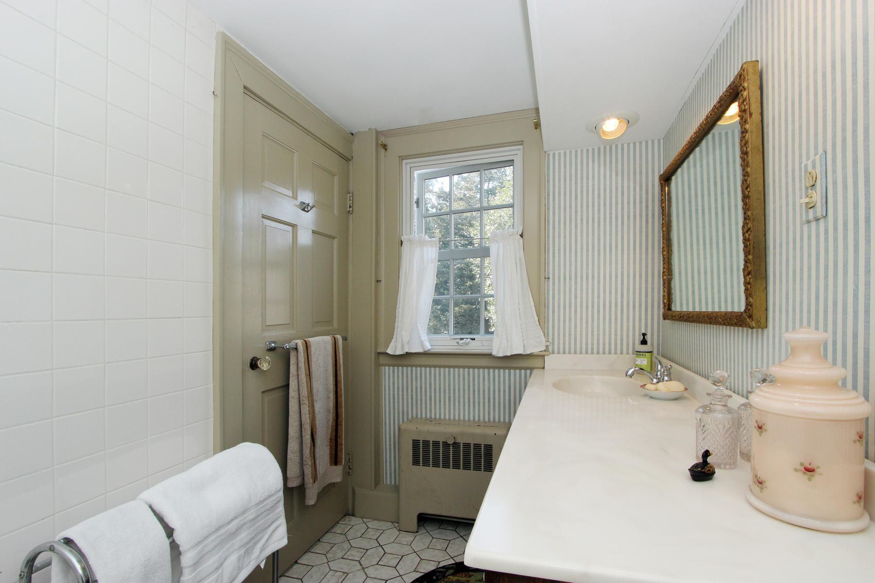 163 Pochet Road Orleans, MA 02653 - Photo 35 of 67 a bathroom with a sink toilet and shower