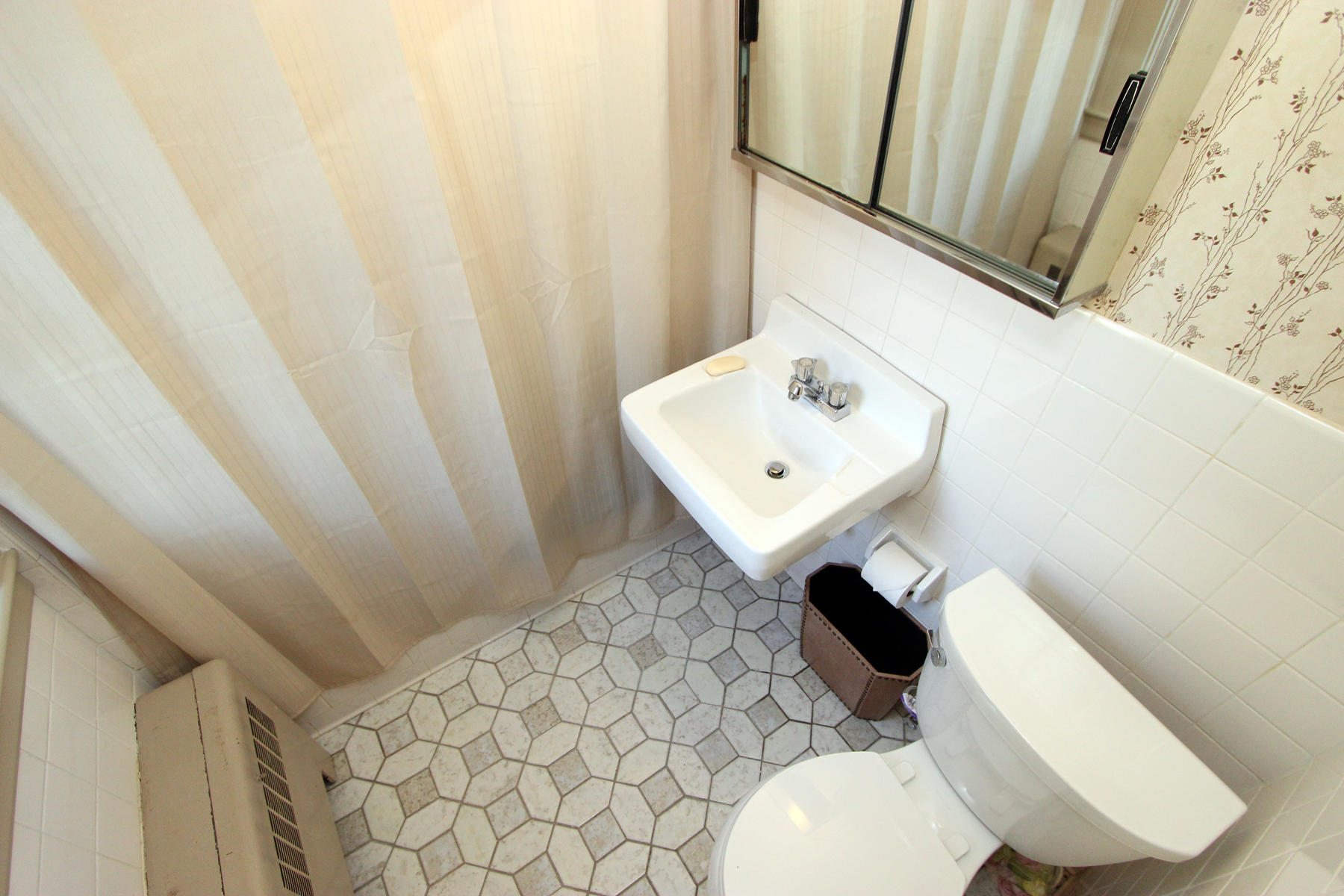 163 Pochet Road Orleans, MA 02653 - Photo 41 of 67 a bathroom with a sink and a mirror