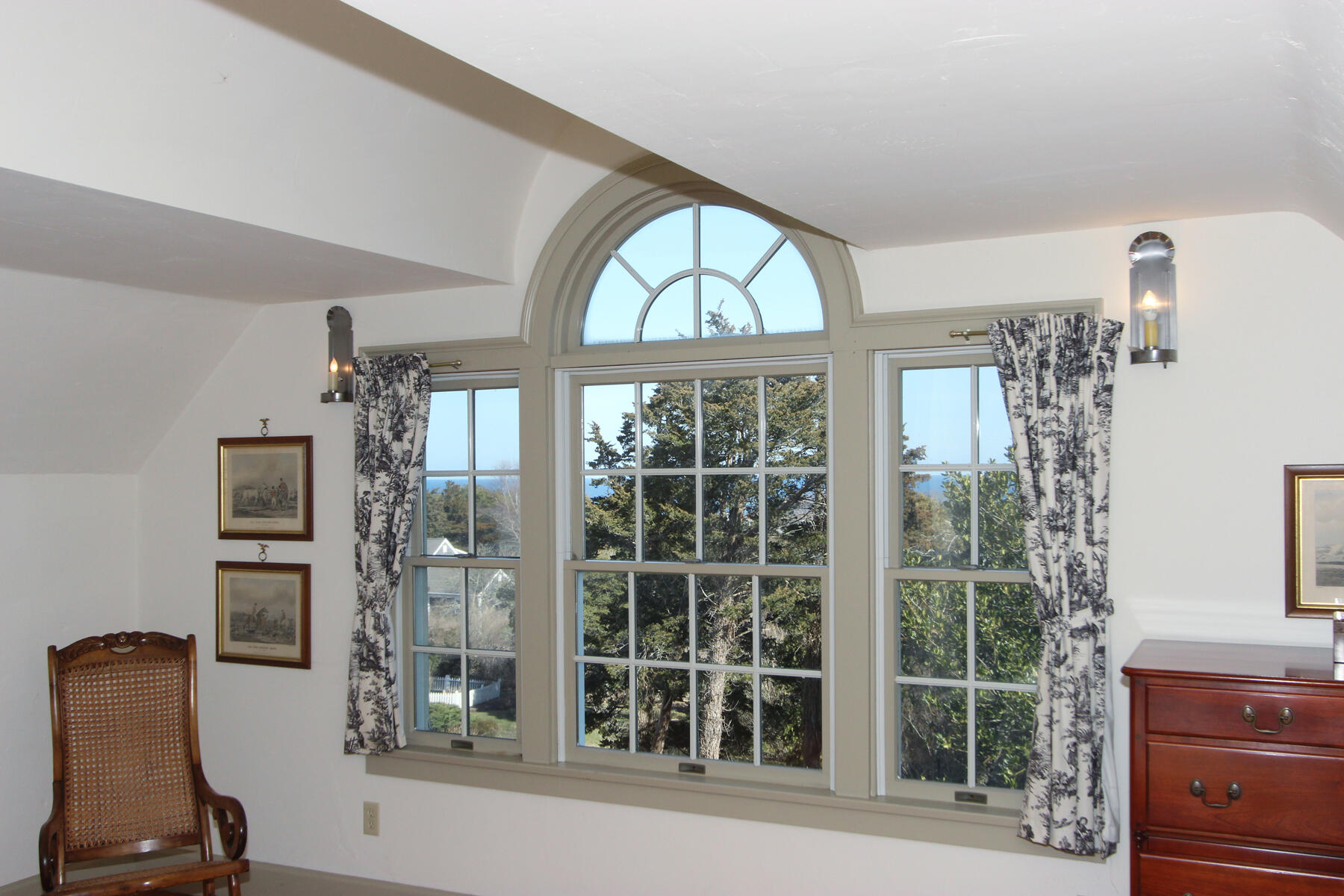 163 Pochet Road Orleans, MA 02653 - Photo 44 of 67 a view of a room with a large window and wooden floor