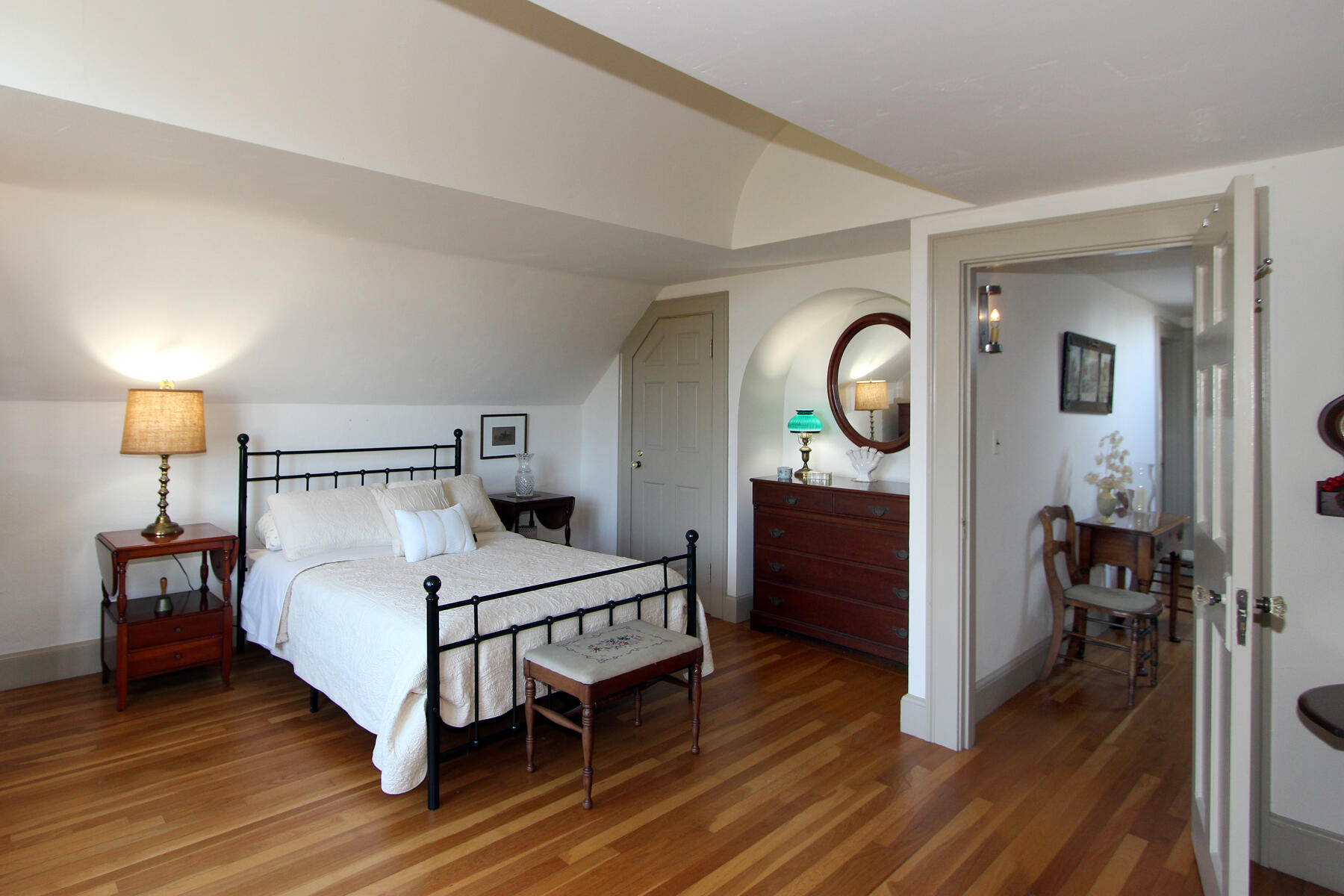 163 Pochet Road Orleans, MA 02653 - Photo 46 of 67 a bedroom with a bed and a dresser