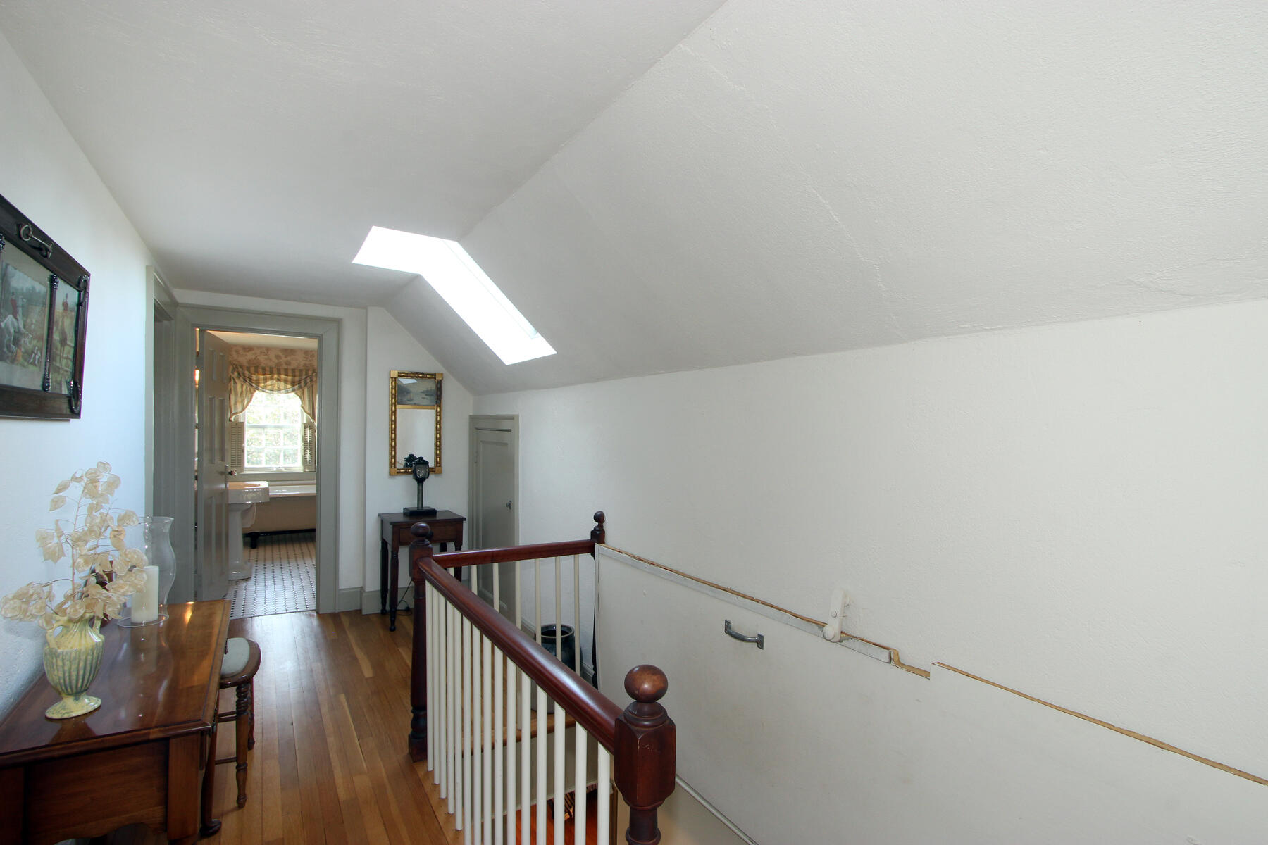 163 Pochet Road Orleans, MA 02653 - Photo 47 of 67 a view of a livingroom with wooden floor and furniture