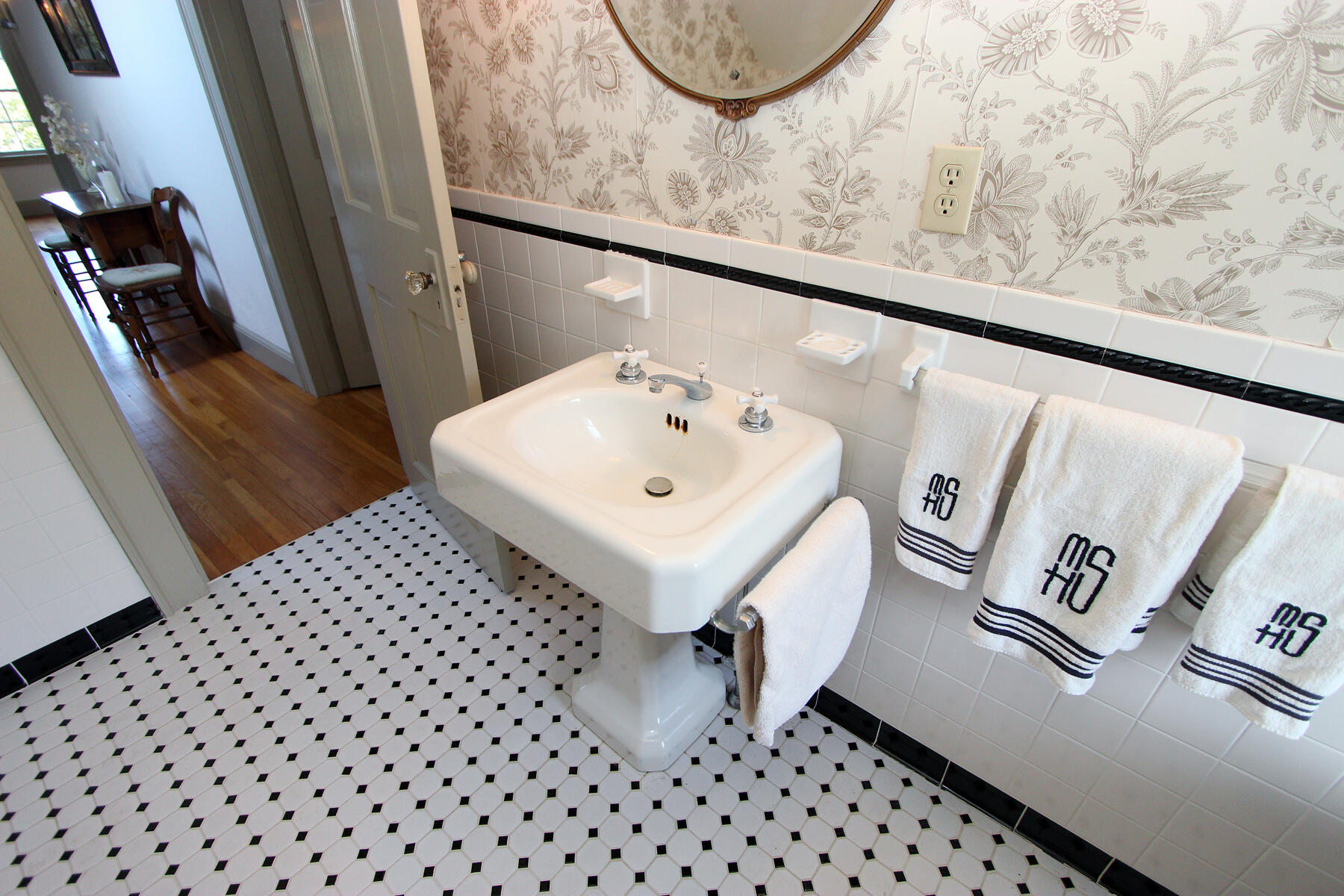 163 Pochet Road Orleans, MA 02653 - Photo 50 of 67 a bathroom with a sink toilet and mirror
