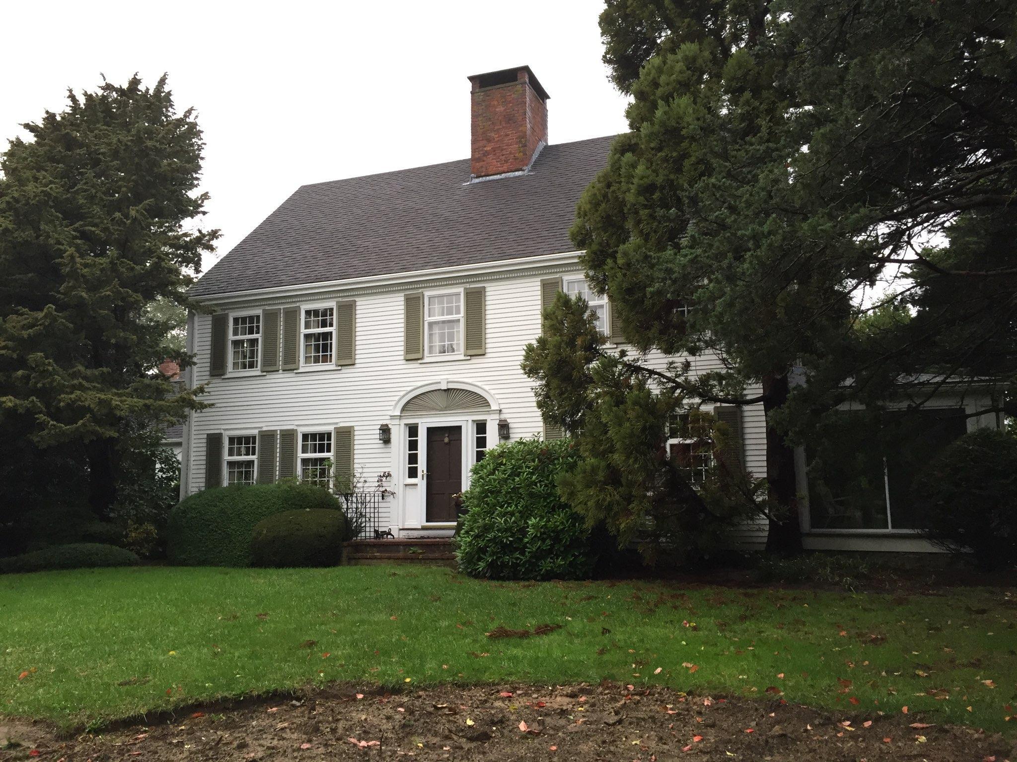 163 Pochet Road Orleans, MA 02653 - Photo 55 of 67 a front view of a house with a garden