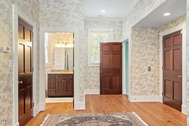 a view of a kitchen with closet and a window