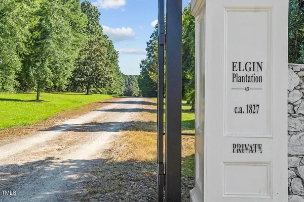 a view of a park that has sign board