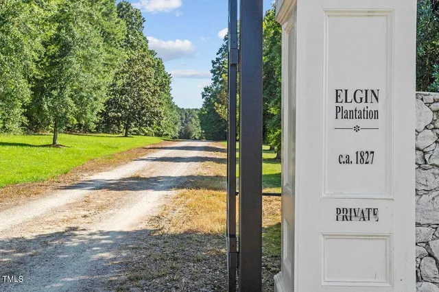 a view of a park that has sign board