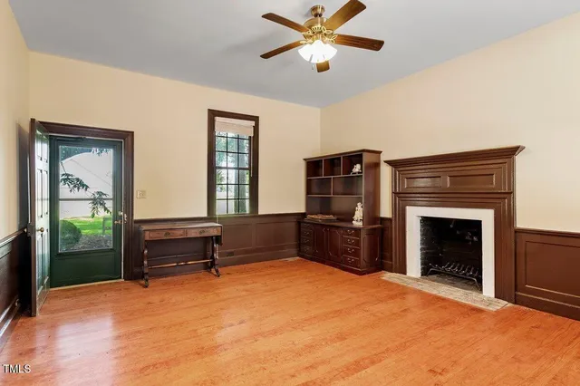 an aerial view of a city with lots of green space