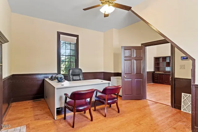 a view of a yard with a large trees