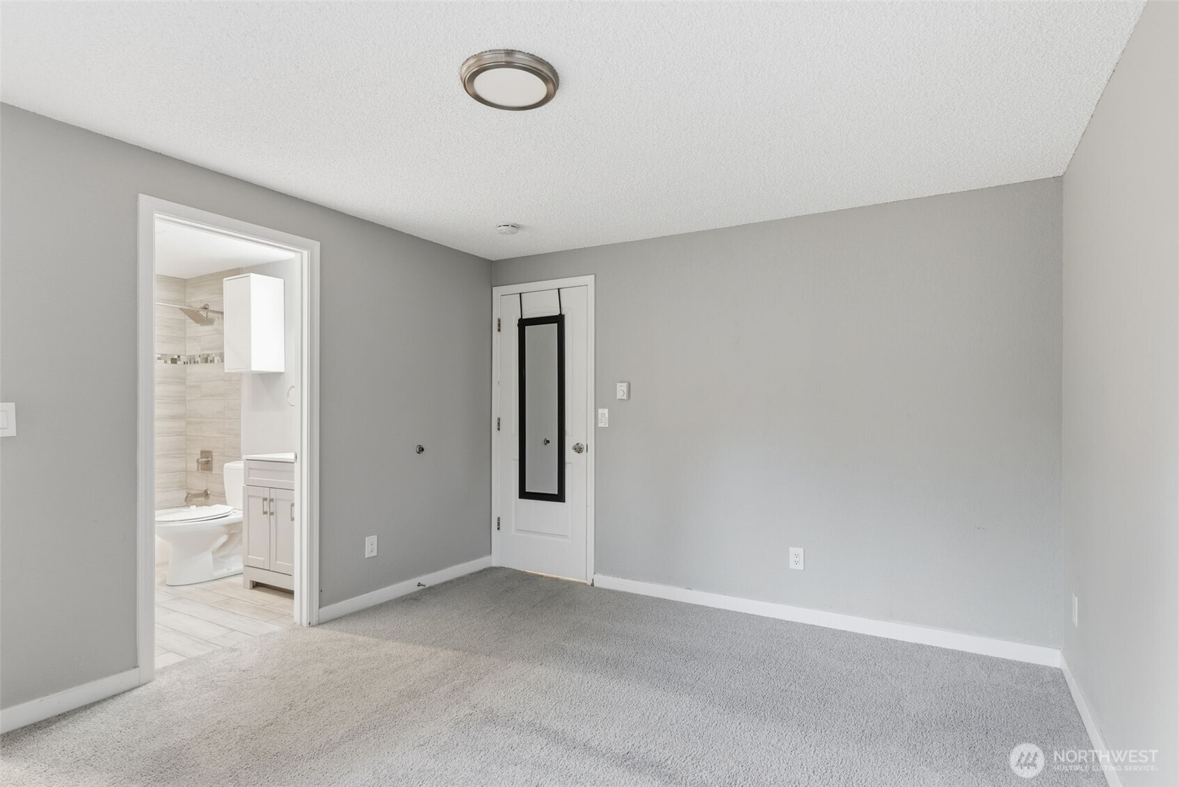 8621 25th Avenue Southwest, Unit B Seattle, WA 98106 - Photo 18 of 33 wooden floor in an empty room
