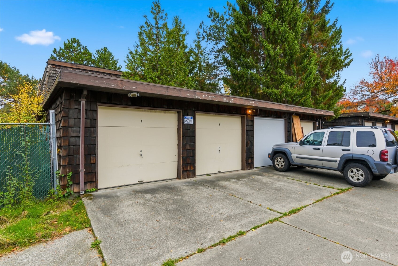 8621 25th Avenue Southwest, Unit B Seattle, WA 98106 - Photo 27 of 33 a view of a car in front of house