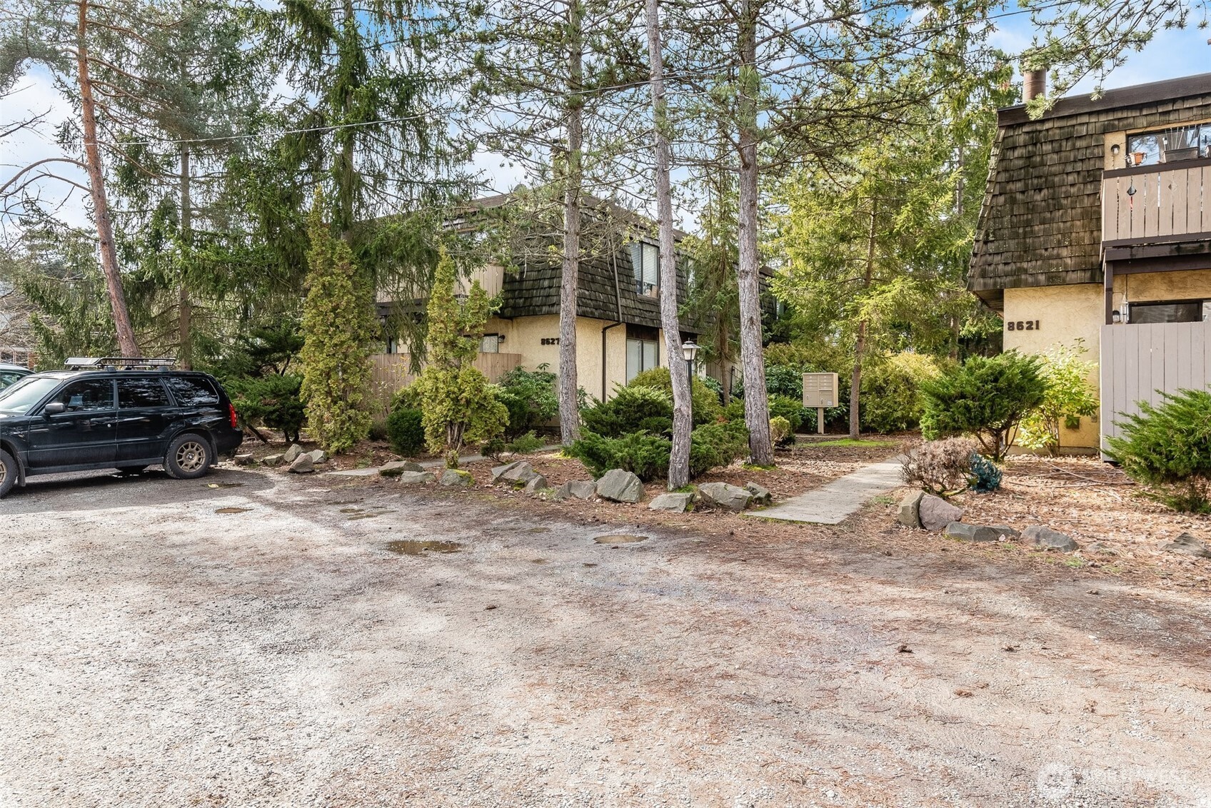 8621 25th Avenue Southwest, Unit B Seattle, WA 98106 - Photo 31 of 33 a view of a car park in front of a house