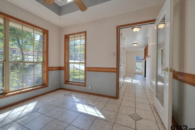 a view of walk in closet with window