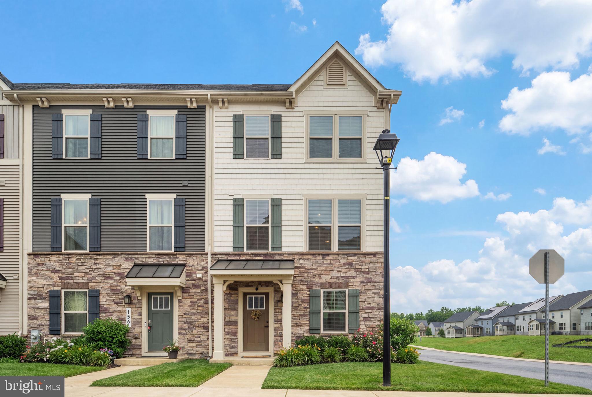 160 Lyons Creek Drive Laurel, MD 20708 - Photo 1 of 88 a front view of a house with garden