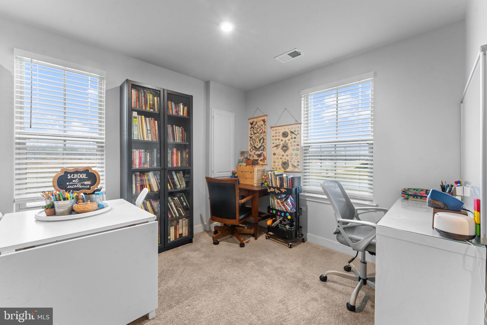 160 Lyons Creek Drive Laurel, MD 20708 - Photo 11 of 88 a view of a workspace with furniture and a window