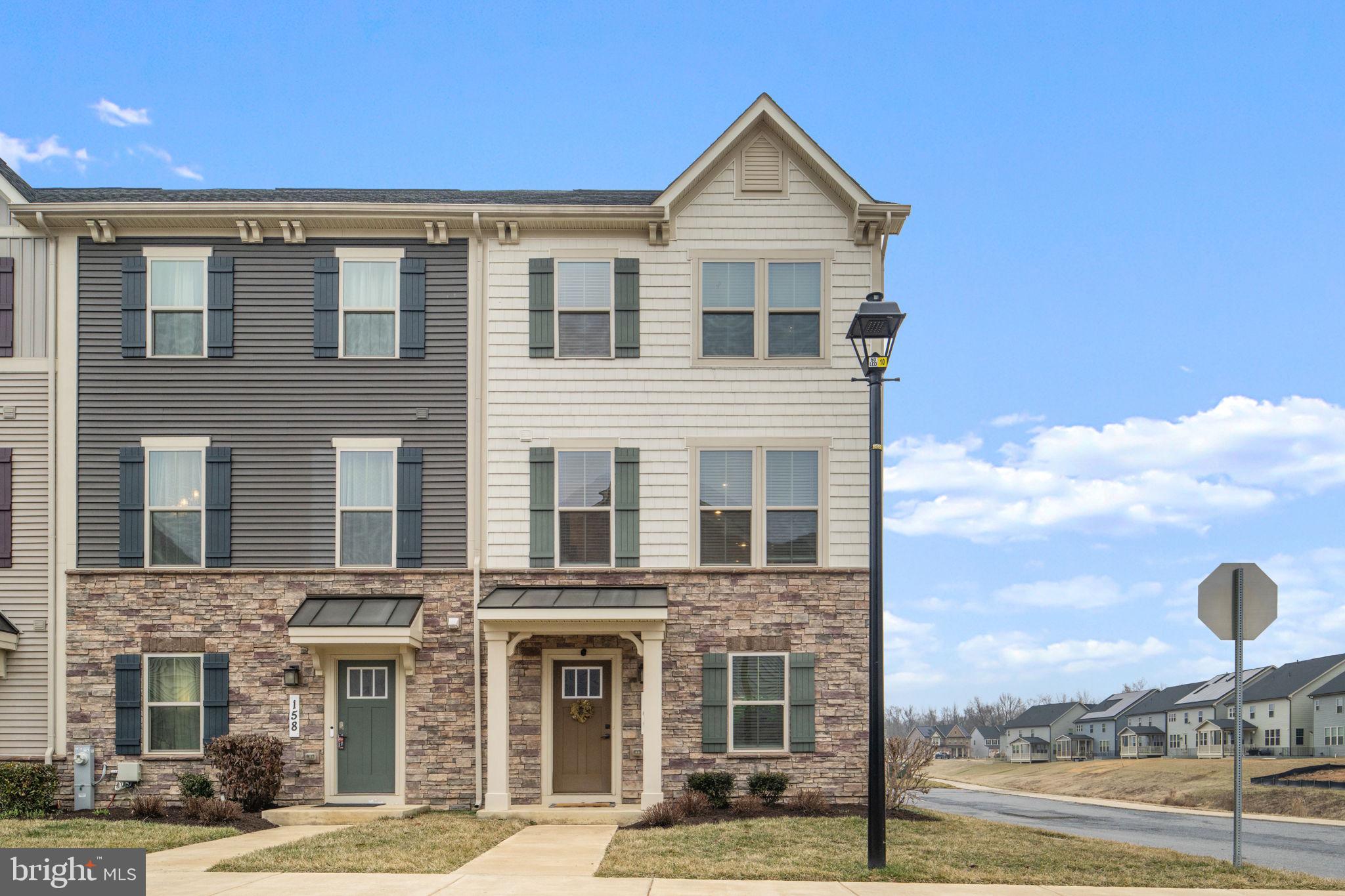 160 Lyons Creek Drive Laurel, MD 20708 - Photo 2 of 88 a front view of a building with street view