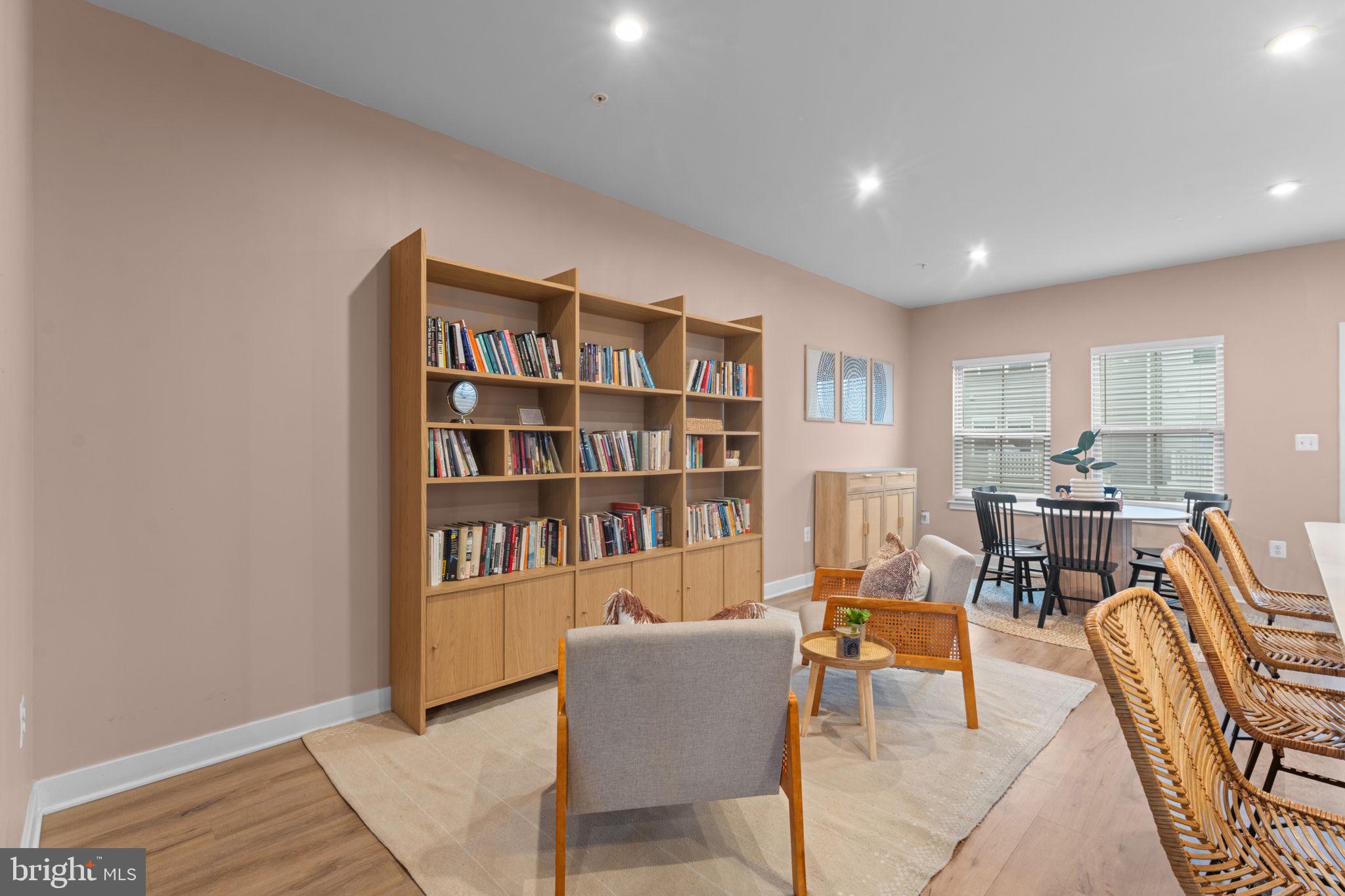 160 Lyons Creek Drive Laurel, MD 20708 - Photo 23 of 88 a living room with furniture and a book shelf