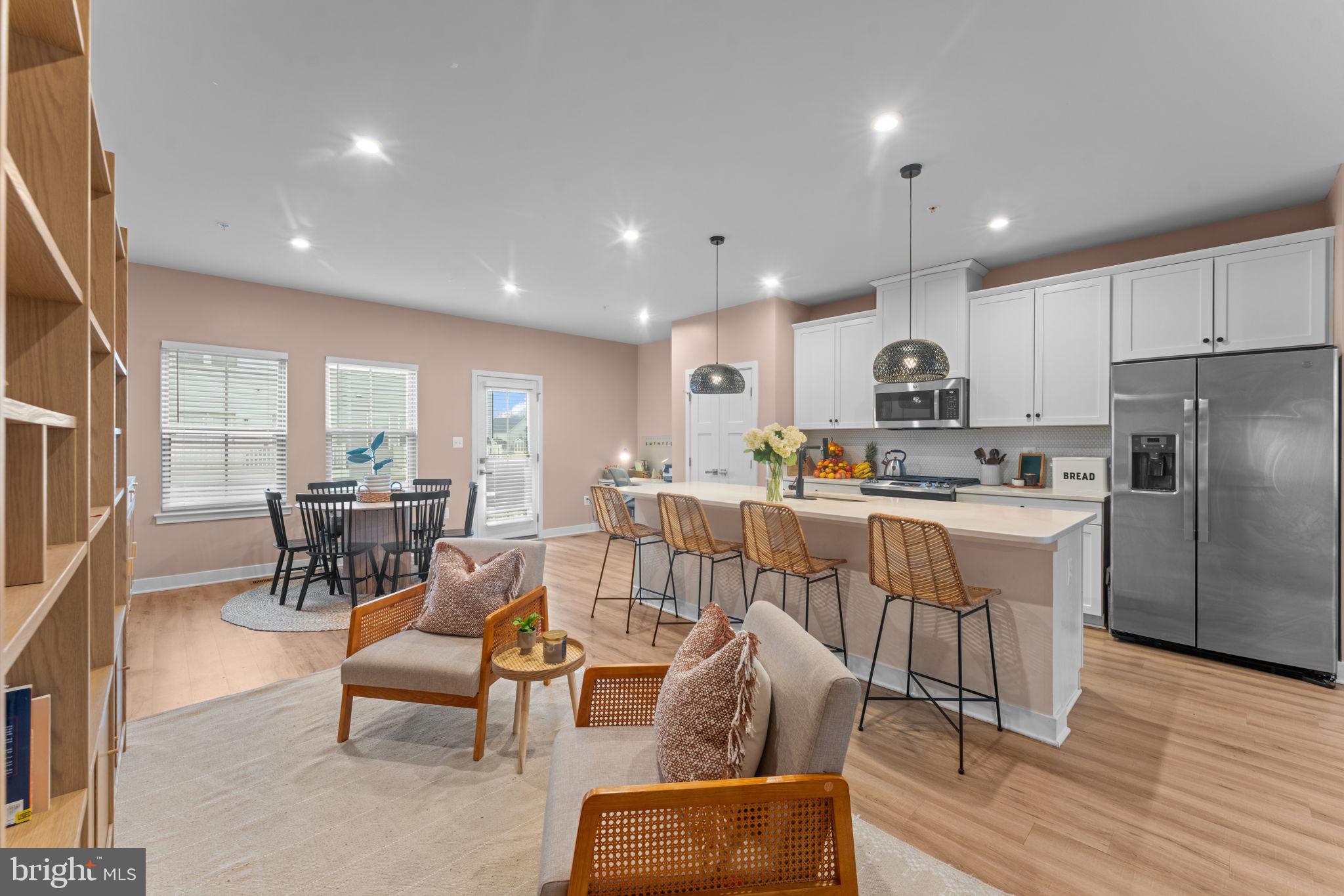 160 Lyons Creek Drive Laurel, MD 20708 - Photo 28 of 88 a living room with stainless steel appliances furniture cabinets and a wooden floor