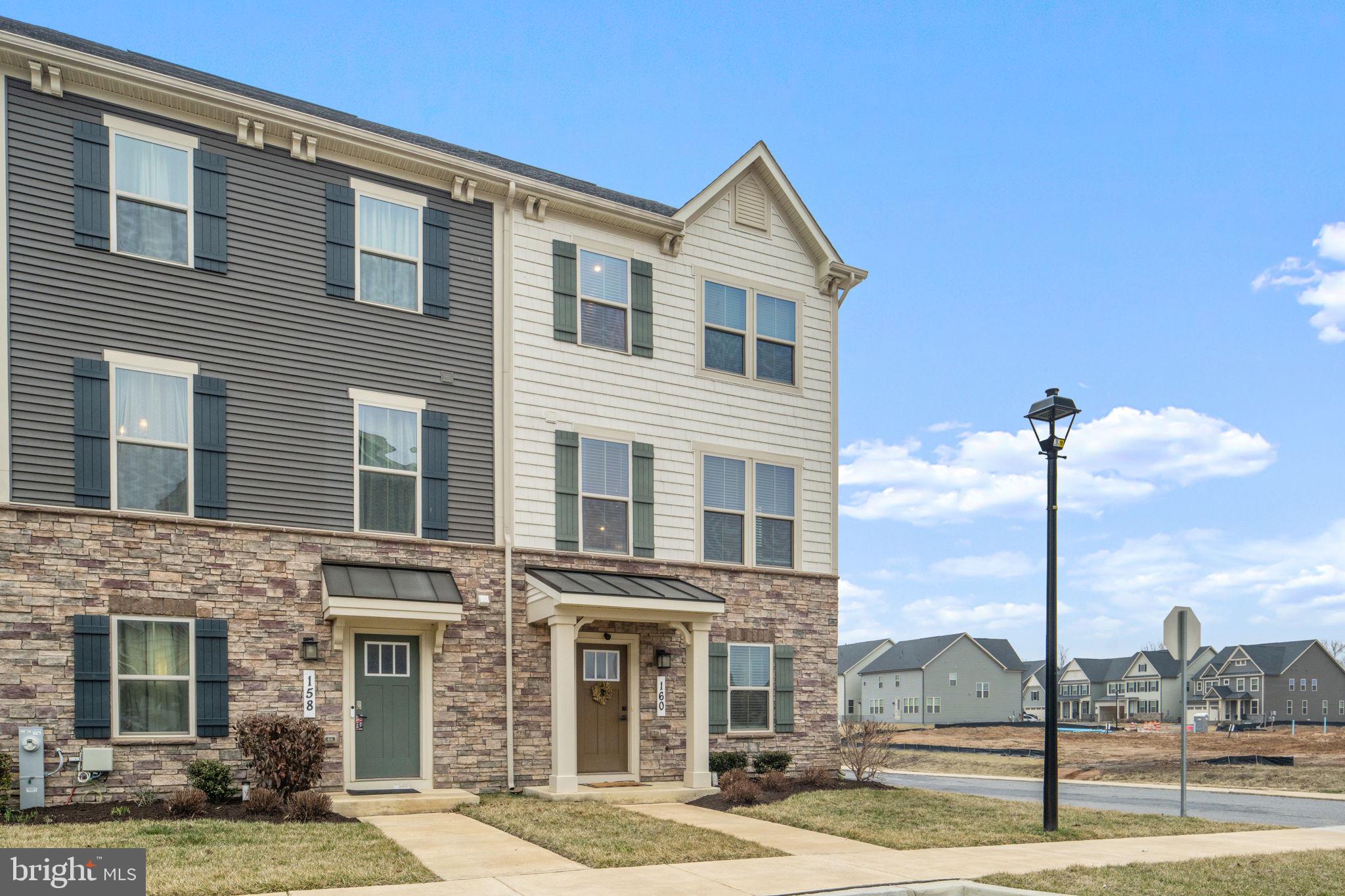160 Lyons Creek Drive Laurel, MD 20708 - Photo 4 of 88 a front view of a building with street view