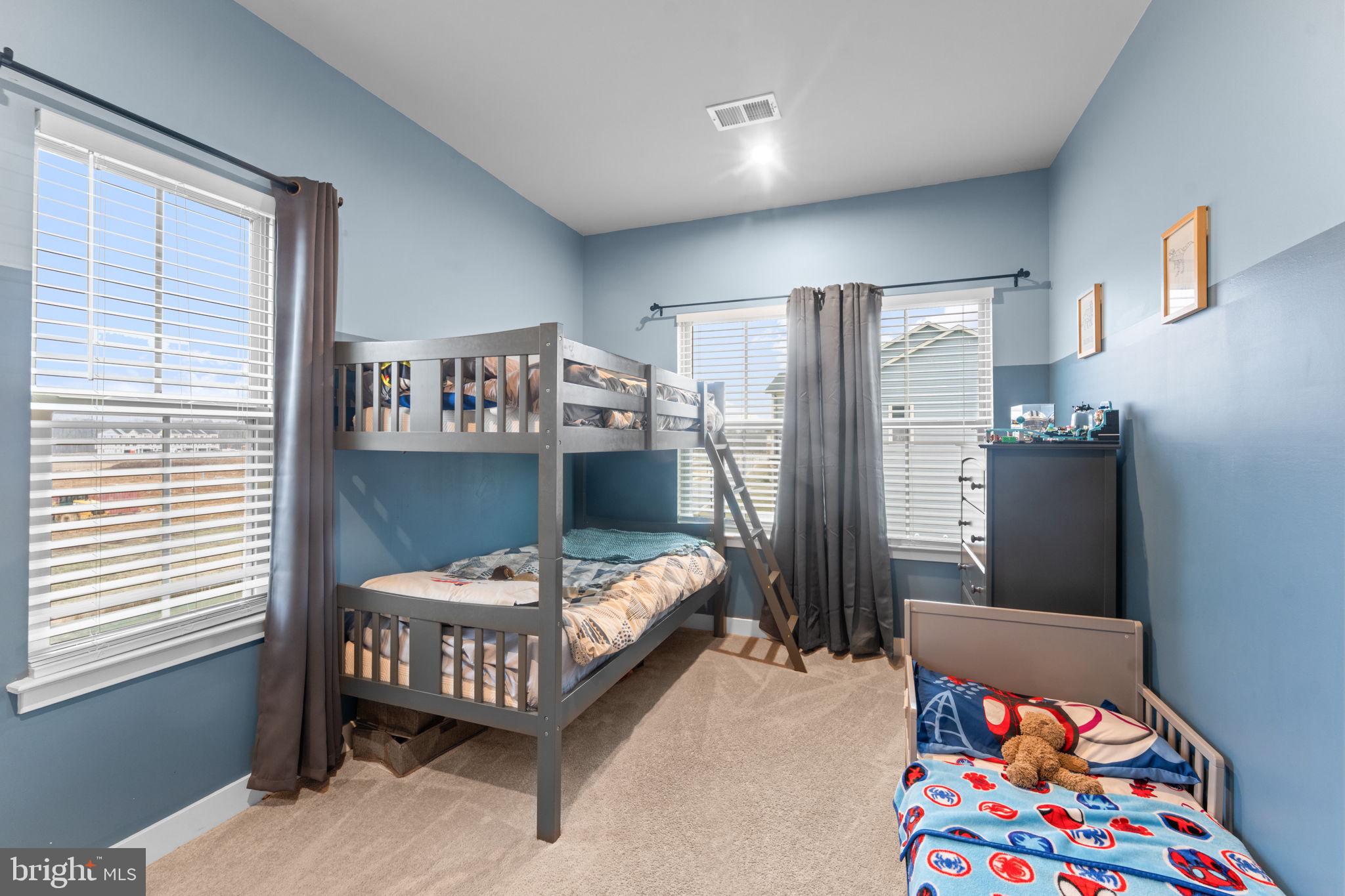160 Lyons Creek Drive Laurel, MD 20708 - Photo 47 of 88 a bedroom with a bed and a dresser
