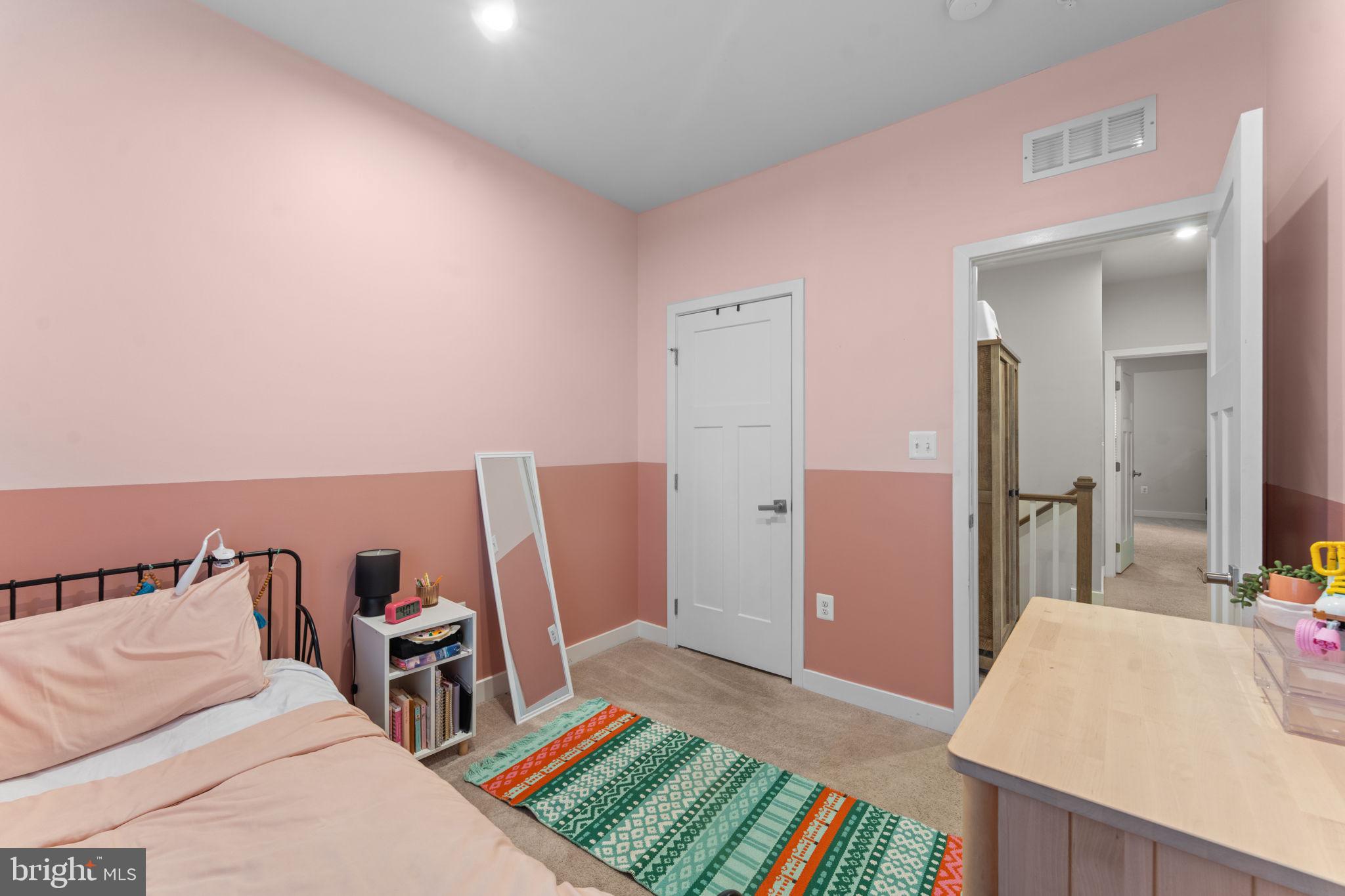 160 Lyons Creek Drive Laurel, MD 20708 - Photo 50 of 88 a bed room with a bed and a chair