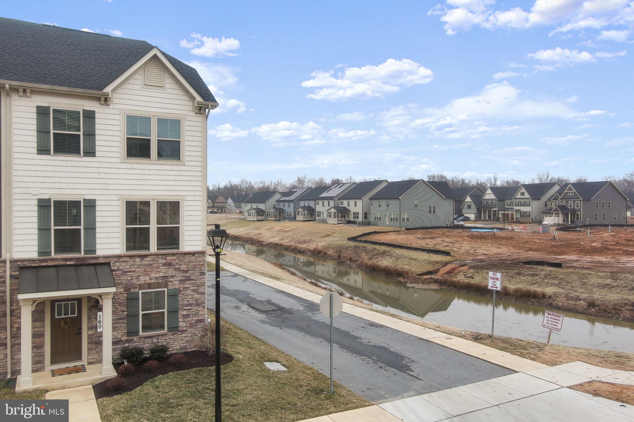 160 Lyons Creek Drive Laurel, MD 20708 - Photo 62 of 88 a view of a house with a yard
