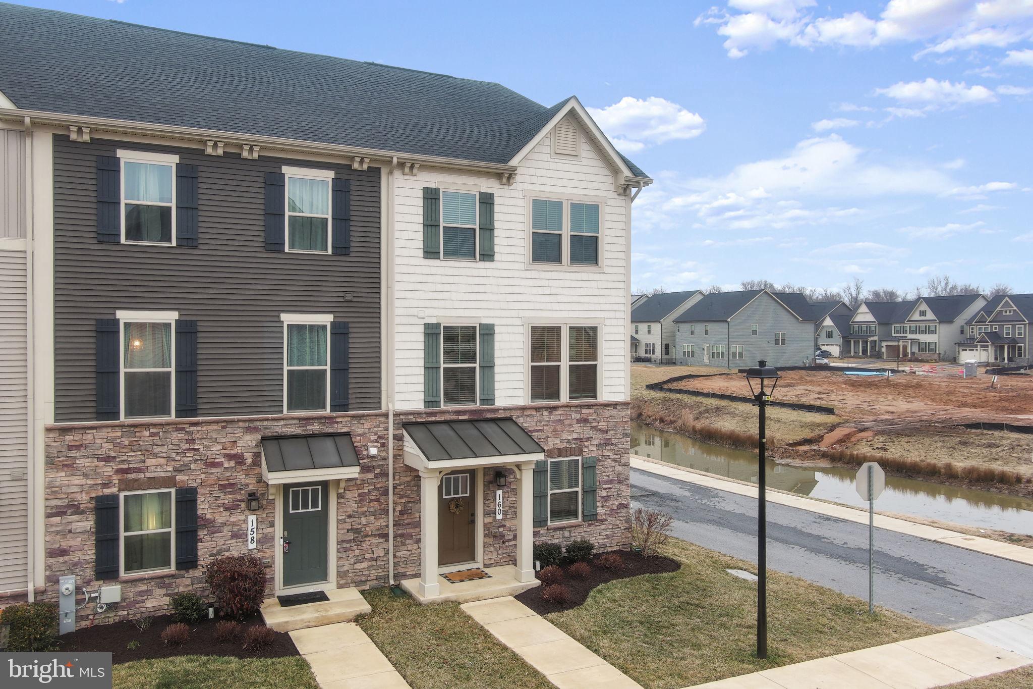 160 Lyons Creek Drive Laurel, MD 20708 - Photo 63 of 88 a front view of a building with street