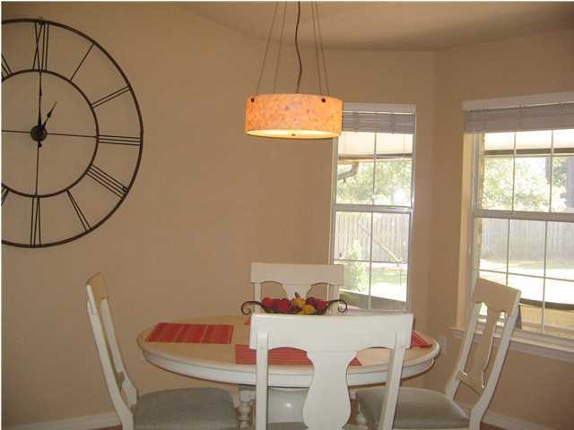 174 East Shipwreck Road Santa Rosa Beach, FL 32459 - Photo 6 of 11 a view of a dining room with furniture and window