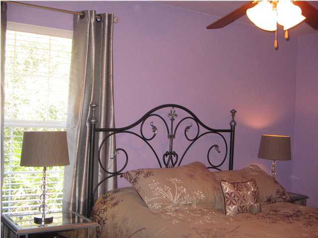174 East Shipwreck Road Santa Rosa Beach, FL 32459 - Photo 7 of 11 a bedroom with a bed and a window