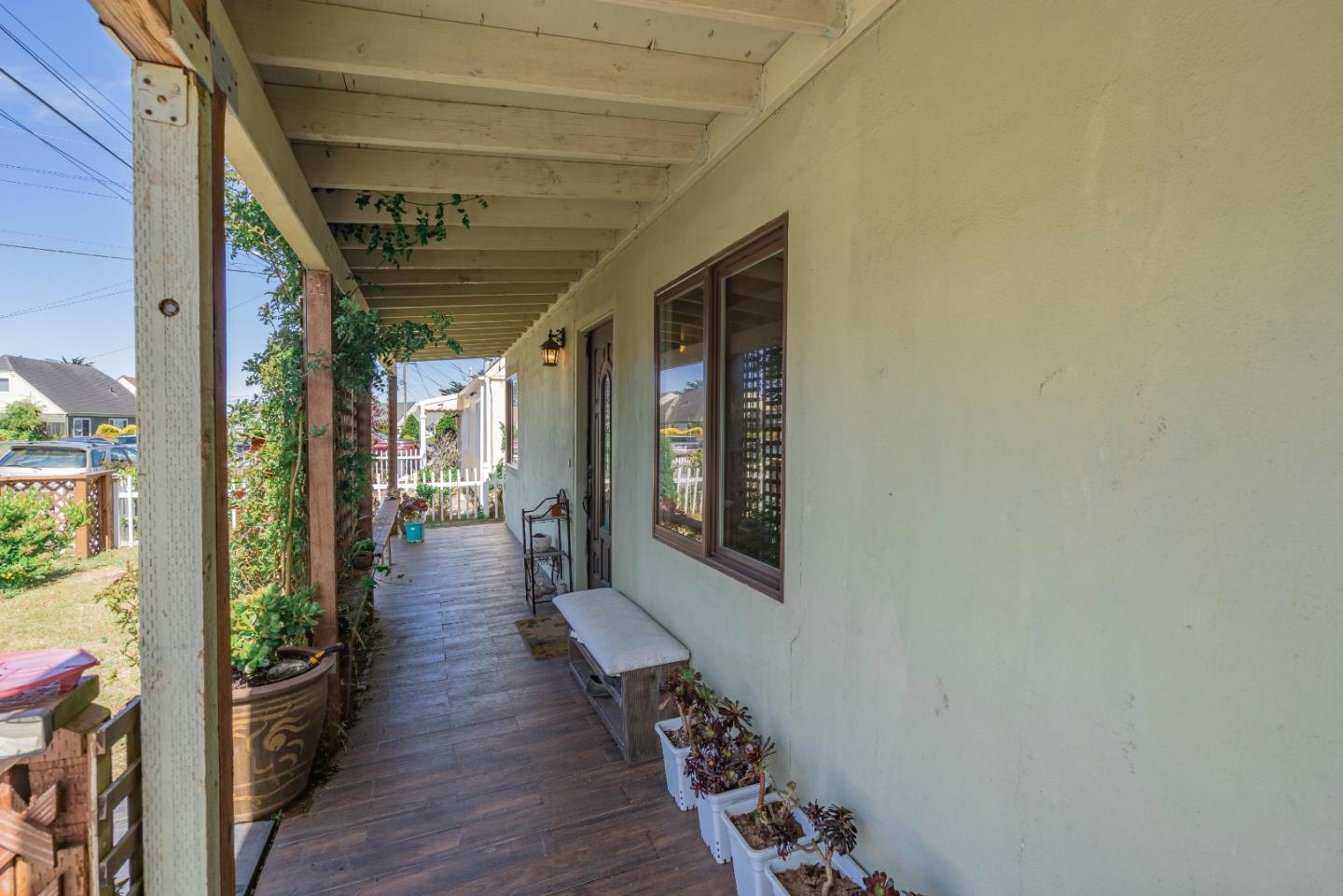348 Heathcliff Drive Pacifica, CA 94044 - Photo 2 of 37 a hallway with wooden floor