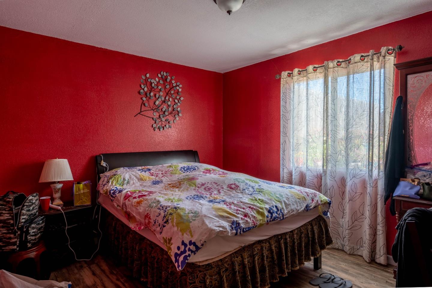 348 Heathcliff Drive Pacifica, CA 94044 - Photo 25 of 37 a bedroom with a bed and a flat screen tv