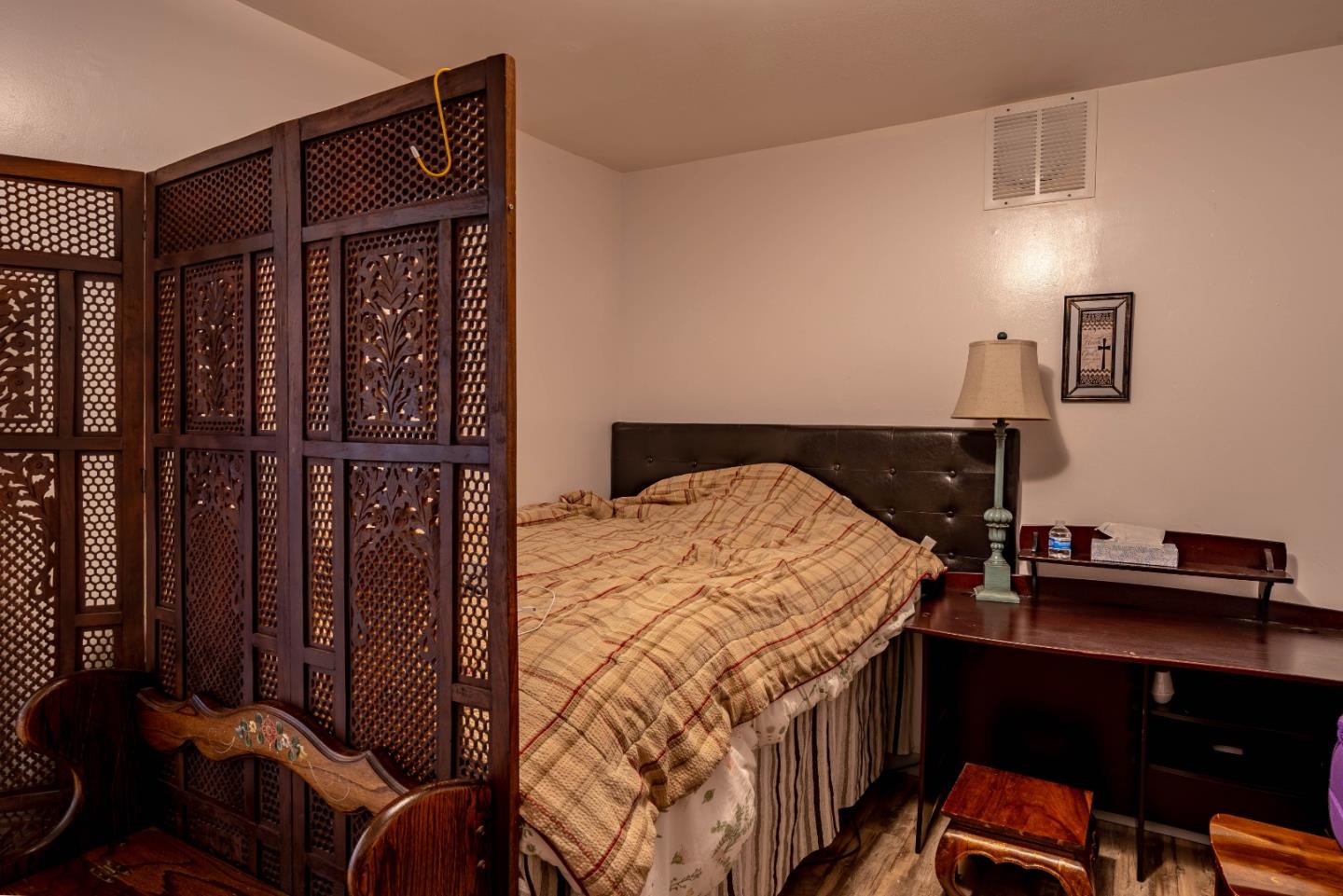 348 Heathcliff Drive Pacifica, CA 94044 - Photo 27 of 37 a bedroom with a bed and a desk