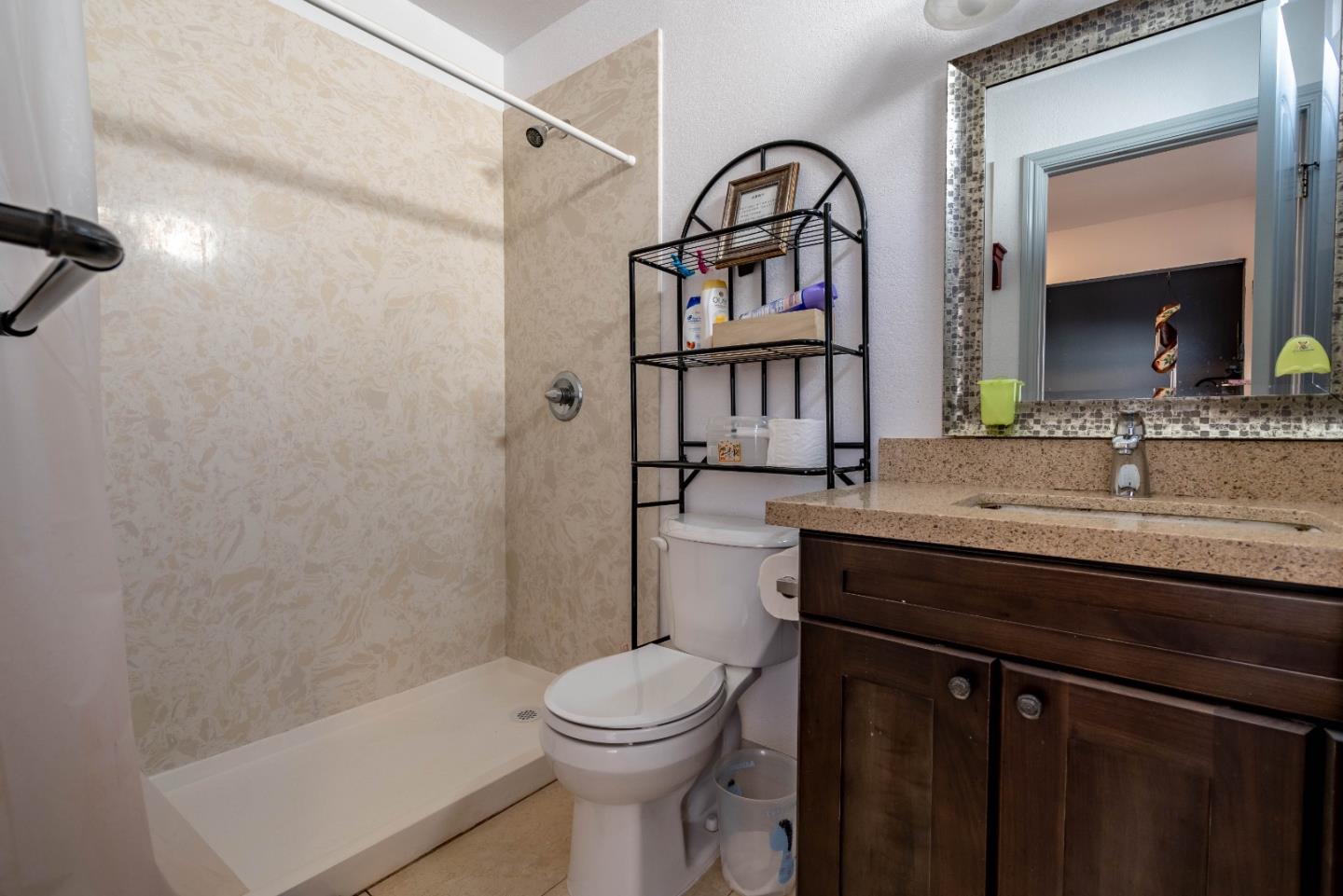 348 Heathcliff Drive Pacifica, CA 94044 - Photo 28 of 37 a bathroom with a sink a toilet and shower