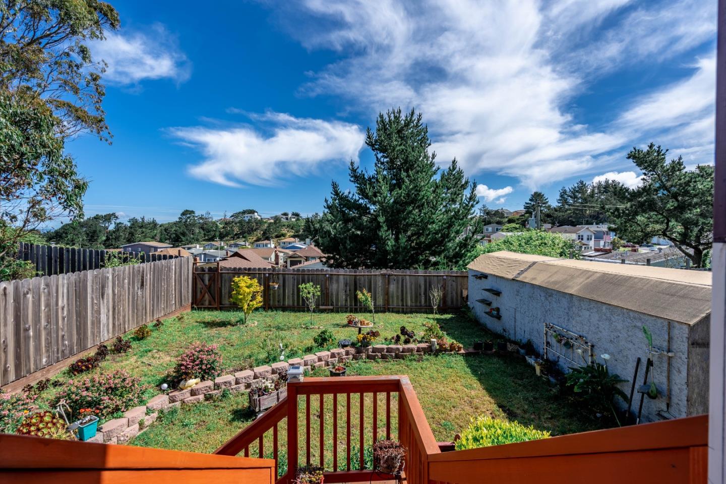 348 Heathcliff Drive Pacifica, CA 94044 - Photo 33 of 37 a view of a backyard with sitting area