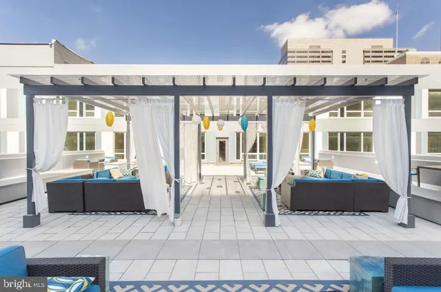 a lobby with furniture and window